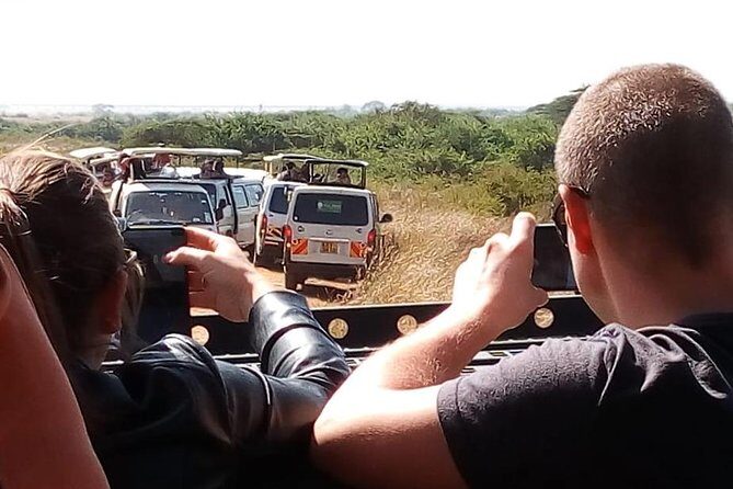 Lake Nakuru National Park Day Tour - Flamingoes at Lake Nakuru: Pink Feed and Photo Time