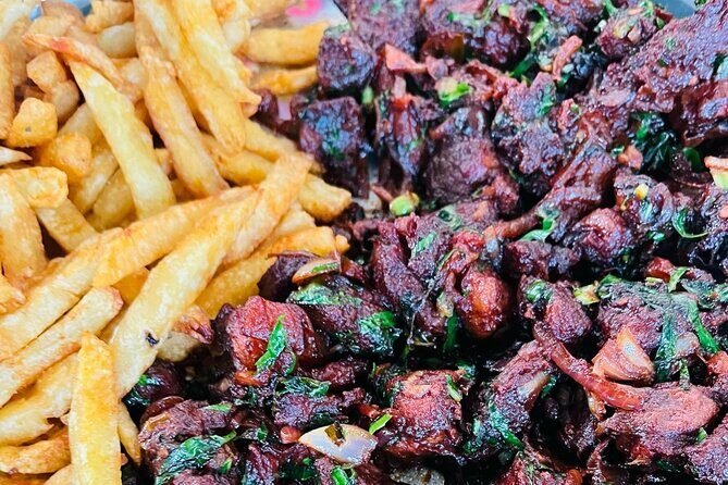 Nairobi Food Tour - Street Food Experience Lunch - Grilling time: nyama choma, kuku choma, and local greens