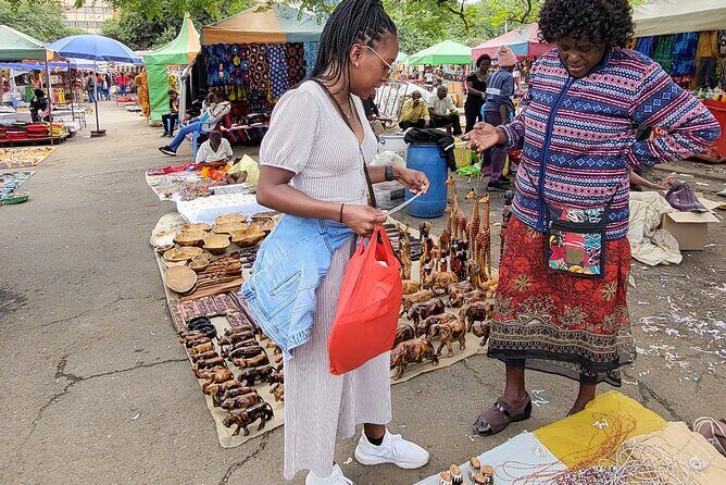 Souvenir Crafts, Fabric Shopping & Hair Braiding & City Tour - Ankara fabric market: picking prints you’ll love and using the design options