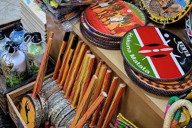 Souvenir Crafts, Fabric Shopping & Hair Braiding & City Tour - The city sights walk: what you’re actually seeing between shops