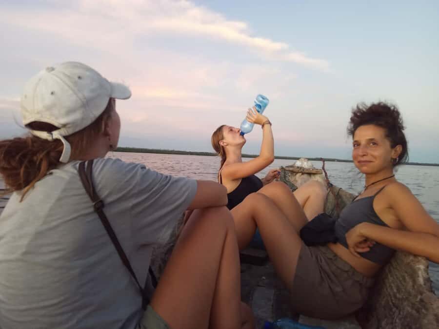 Watamu: Sunset Mangrove Canoe Tour with Coconut Drink - Giriama village stop: coconut or palm wine, plus village context